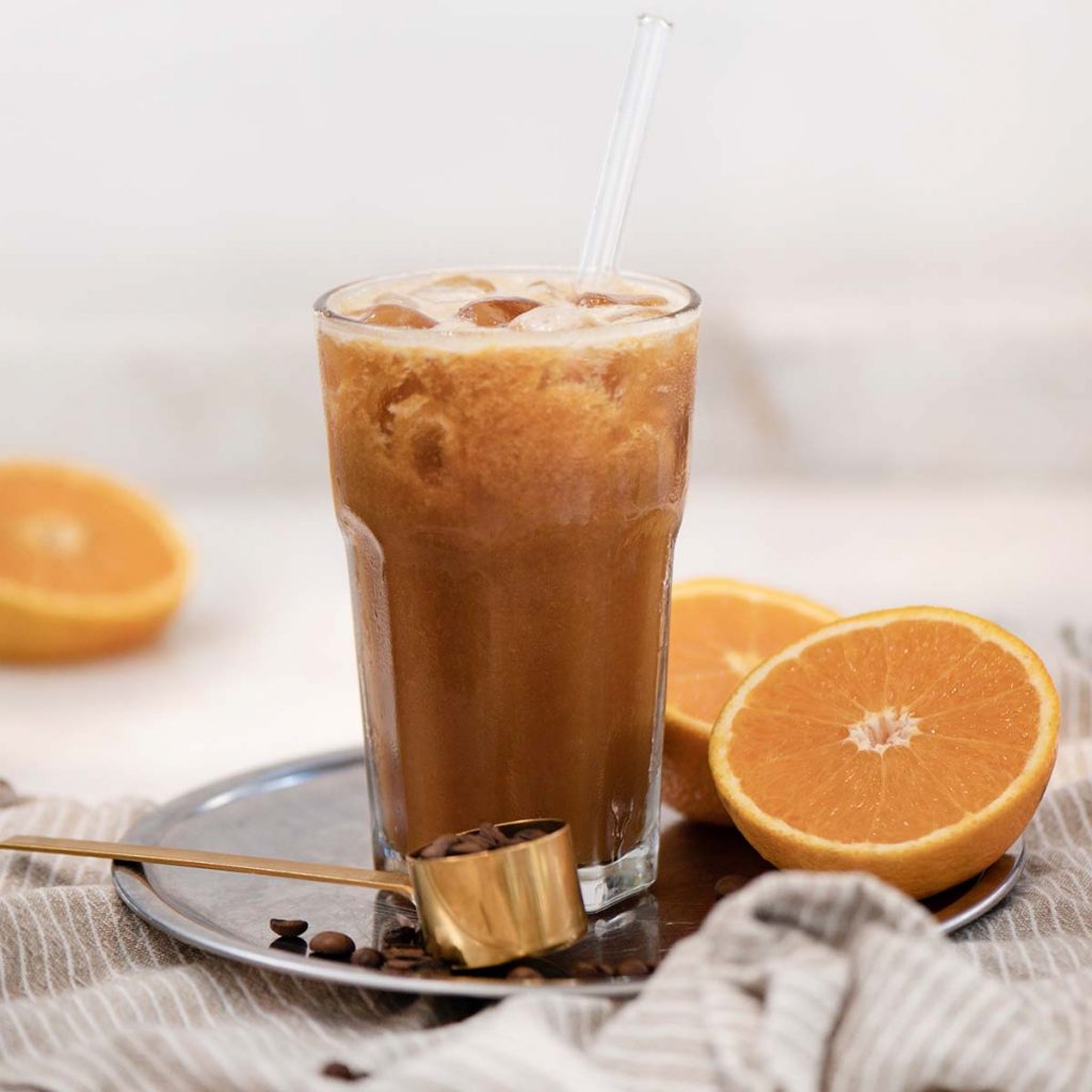 iced-coffee-and-fresh-ripe-orange-juice-beverage-d-PWXJ3FH.jpg